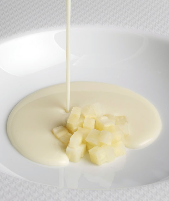 Soup is the easiest of meals to prepare and one of the most important: This fancy looking soup is simply celery root cooked with onion and milk, pureed, strained, and poured over some diced celery root for garnish. Photo by Donna Turner Ruhlman.