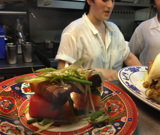 Spying at the pass the pork belly and watermelon at the Fatty Crab.