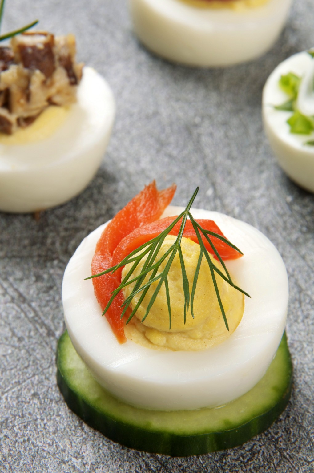 Deviled egg with smoked salmon and dill on a cucumber wheel. Photo by Donna Turner Ruhlman.